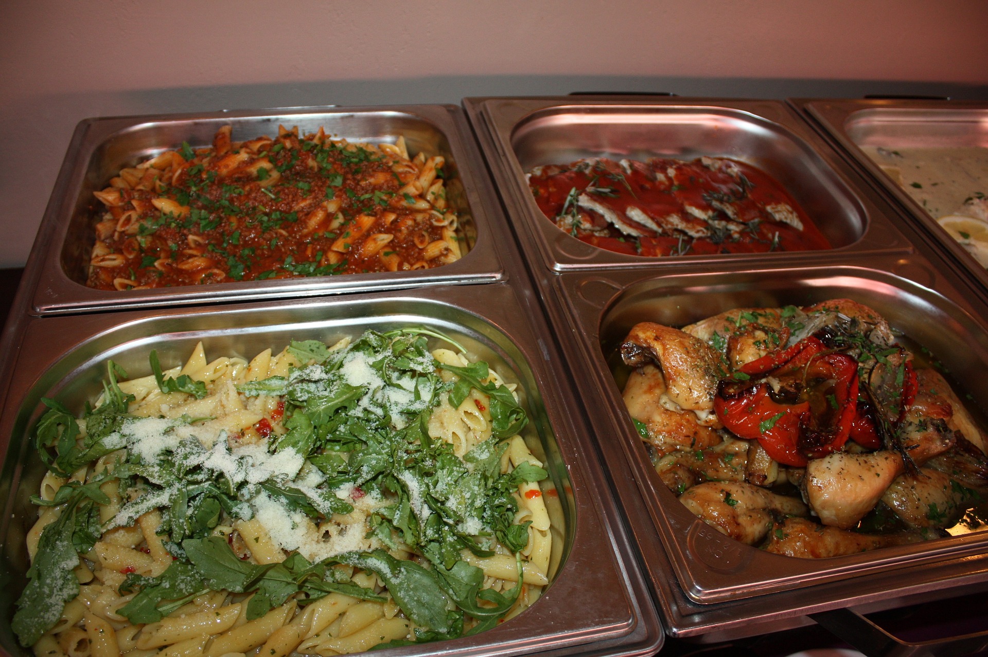 buffet food in warming trays